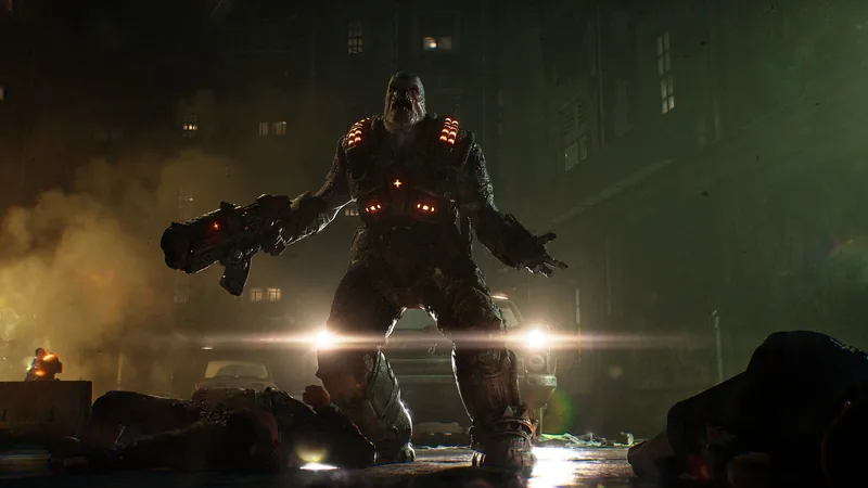A hulking Locust with glowing red lights on its armor stands in a dark street holding a heavy weapon