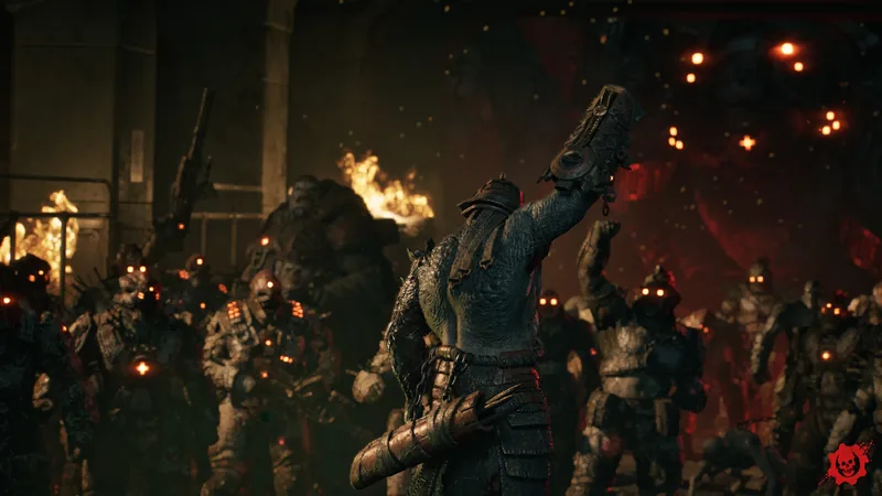 A Locust raises a jagged blade in the air in front of a crowd of Locust with glowing red eyes