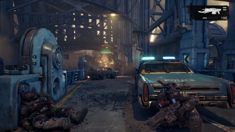 A Gear takes cover behind a police car on a city street while another soldier crouches beside blue machinery